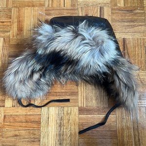 Brown leather and fur winter hat with ear flaps